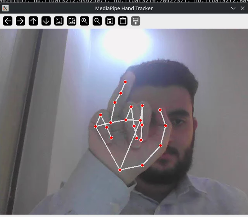 The MediaPipe landmark skeleton overlaid on a hand in the tracker’s preview window